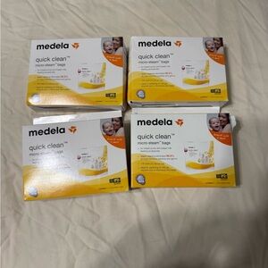Medela Quick Clean Micro-Steam Bags in Yellow and White Packaging